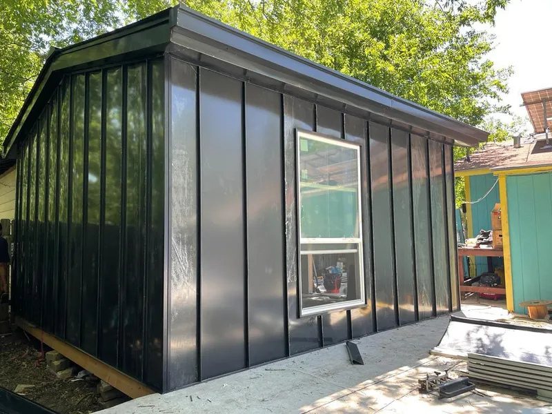 Black standing seam metal wall panels for Metal Roof Installation in North Salt Lake