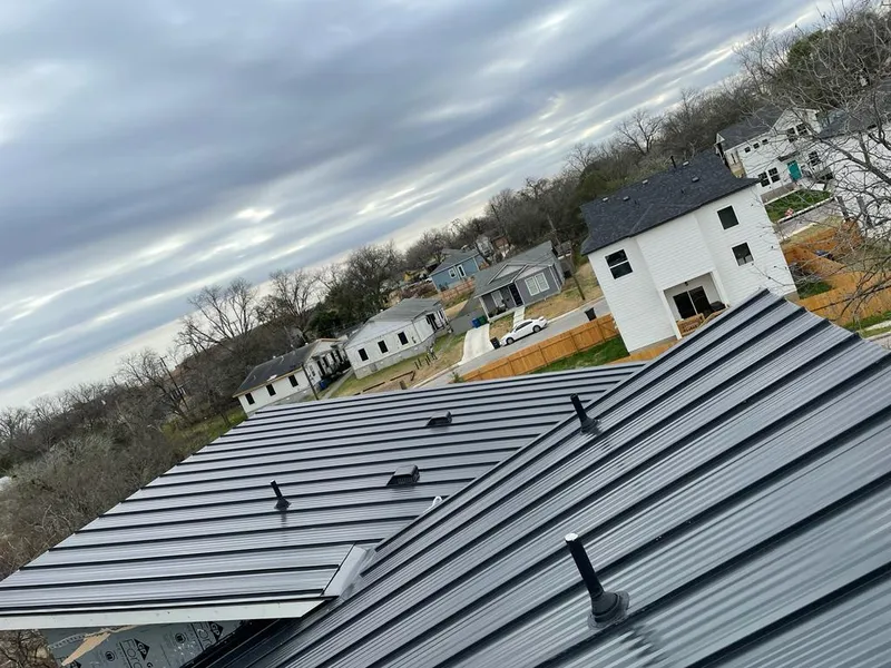 Standing seam metal roof panels with vents for Skylight Repair in North Salt Lake